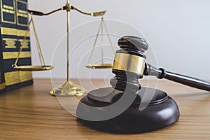 Scales of justice and Gavel on sounding block, object and law book to working with judge agreement in Courtroom, Justice and Law