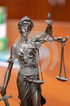 Scales of Justice, the symbol of a statue of blindfolded
