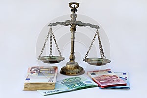 Scales and many euro notes