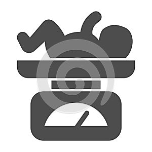 Scales with newborn child solid icon, Medical concept, balance with child sign on white background, Baby on scale icon