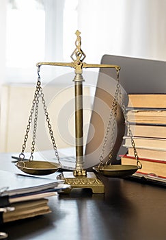 Scales workplace lawyer office laptop document table