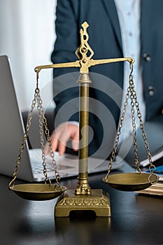 Scales workplace lawyer office laptop document table type hand