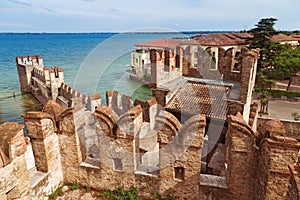 Scaliger castle is historical landmark of the city Sirmione in Italy on the Lake Garda. Medieval Italian castle. ea