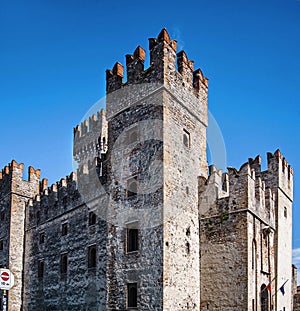Scaliger Castle in Sirmione against the blue sky.