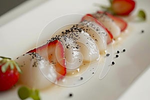 Scallop crudo with strawberries and black pepper