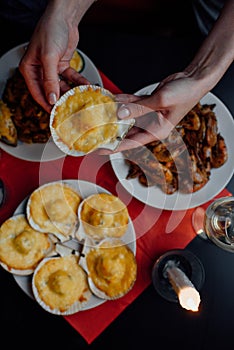 scallop in woman`s hands clouse up