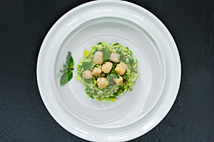 Scallops on minted pea risotto - top view