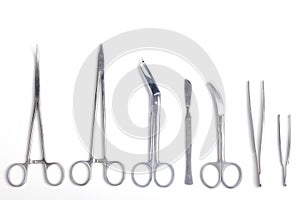 Scalpel, forceps, clamps, scissors - isolated