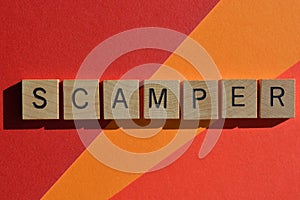 Scamper,  business acronym in 3D wooden alphabet letters