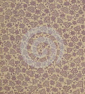 Scan the flyleaf of an old book, yellow-gray-brown, with dense and intricate floral pattern.