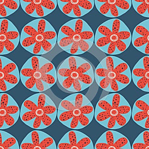 Scandinavian flowers seamless vector background. 1960s, 1970s retro floral design. Red and blue doodle flowers on a blue
