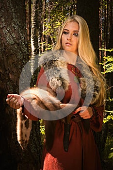Scandinavian girl with fur skins
