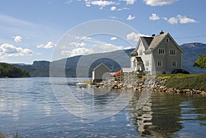 Scandinavian house on hardangerfjord photo