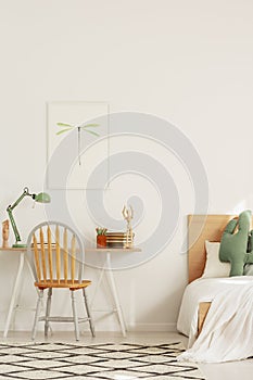 Scandinavian interior design for kids, bedroom and workspace with desk and bed photo