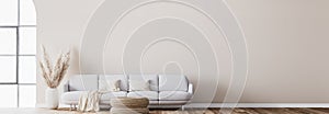 Scandinavian living room design with rattan table, pampas and white sofa on beige background