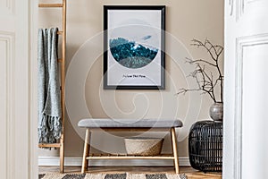 Scandinavian living room with mockup poster frame, stylish furnitures and elegant accessories. Japandi interior design style.