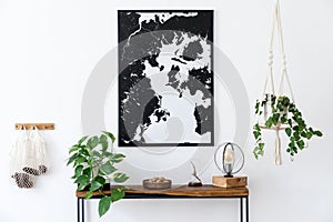 Scandinavian living room with wooden console table and map poster. photo