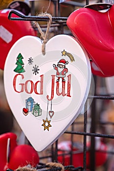 Scandinavian Merry Christmas with the words God Jul on wooden