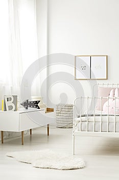 Scandinavian sideboard in child bedroom