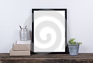 Scandinavian style empty photo frame mock up. Minimal home decor