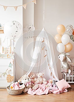 Scandinavian style white interior children's room, bedroom, nursery. Baby cot with canopy tent