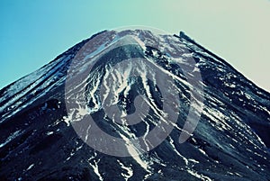 Mount Taranaki Egmont volcanic peak with snow