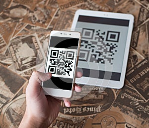 Scanning qr code from the tablet. Cashless purchase