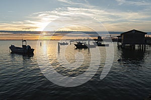 SCARDOVARI, ITALY, 2016-08-06: Fishing huts at Scardovari lagoon