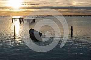 SCARDOVARI, ITALY, 2016-08-06: Mussel cultivation, boats at Scardovari lagoon, italy.