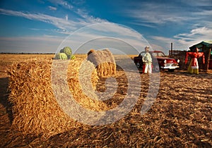 Scarecrow in the farmland oldcar