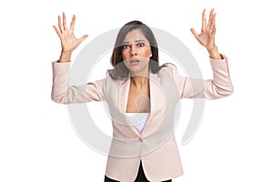 Scared businesswoman freezing with hands in the air