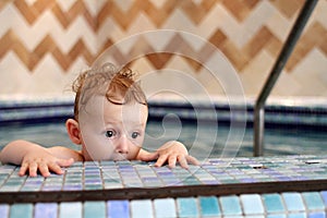 Scared child in pool