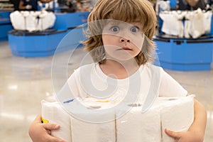 Scared child storing toilet paper during Coronavirus outbreak Covid-19, Concept of Covid-19 quarantine. US epidemic