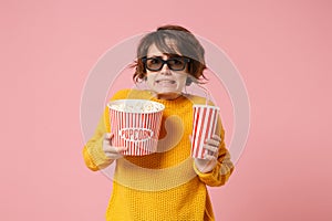 Scared dissatisfied young woman in 3d imax glasses posing isolated on pink background. People in cinema, lifestyle photo