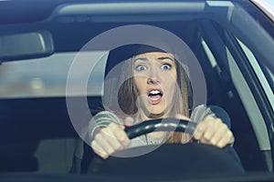 Scared driver driving a car before an accident