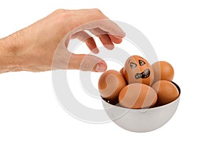 Scared egg, waiting to be grabbed by a hand