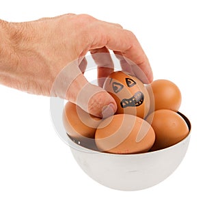Scared egg, waiting to be grabbed by a hand