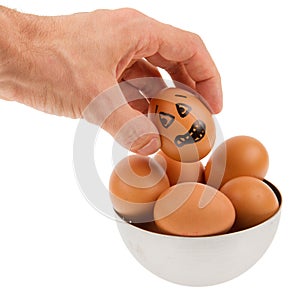 Scared egg, waiting to be grabbed by a hand