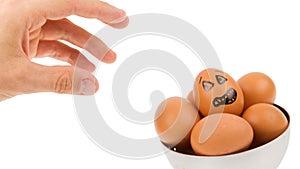 Scared egg, waiting to be grabbed by a hand