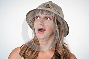 Scared explorer woman with helmet isolated on white