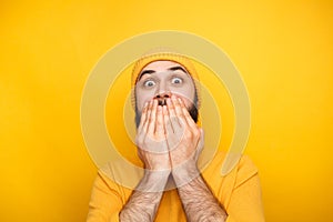 Frightened man in yellow clothes