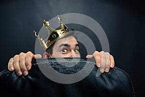 Scared man with crown