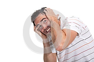 Scared man with hands on head