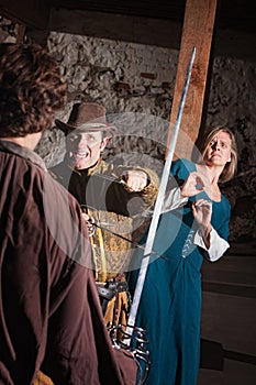 Scared Woman and Sword Fighter