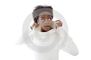 Scared and shocked african american black woman in white sweater