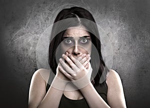 Scared Sick Woman With Hands on Mouth. Drugs Addiction or Domestic Violence Concept