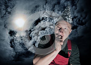 Scared suspecting man waiting for aliens photo