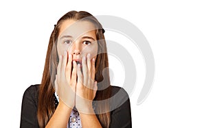 Scared teen girl covering her mouth with hands