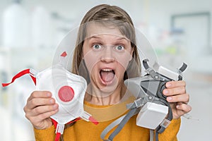 Scared woman chooses FFP3 respirator mask photo