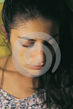 Scared woman with closed eyes